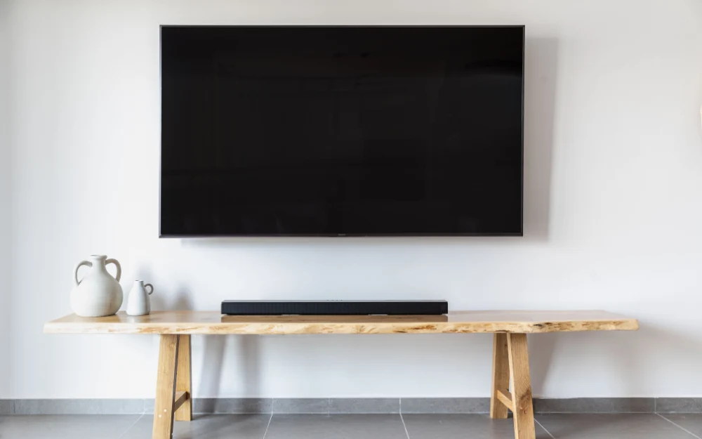 Tv mounted on wall with clean cable management